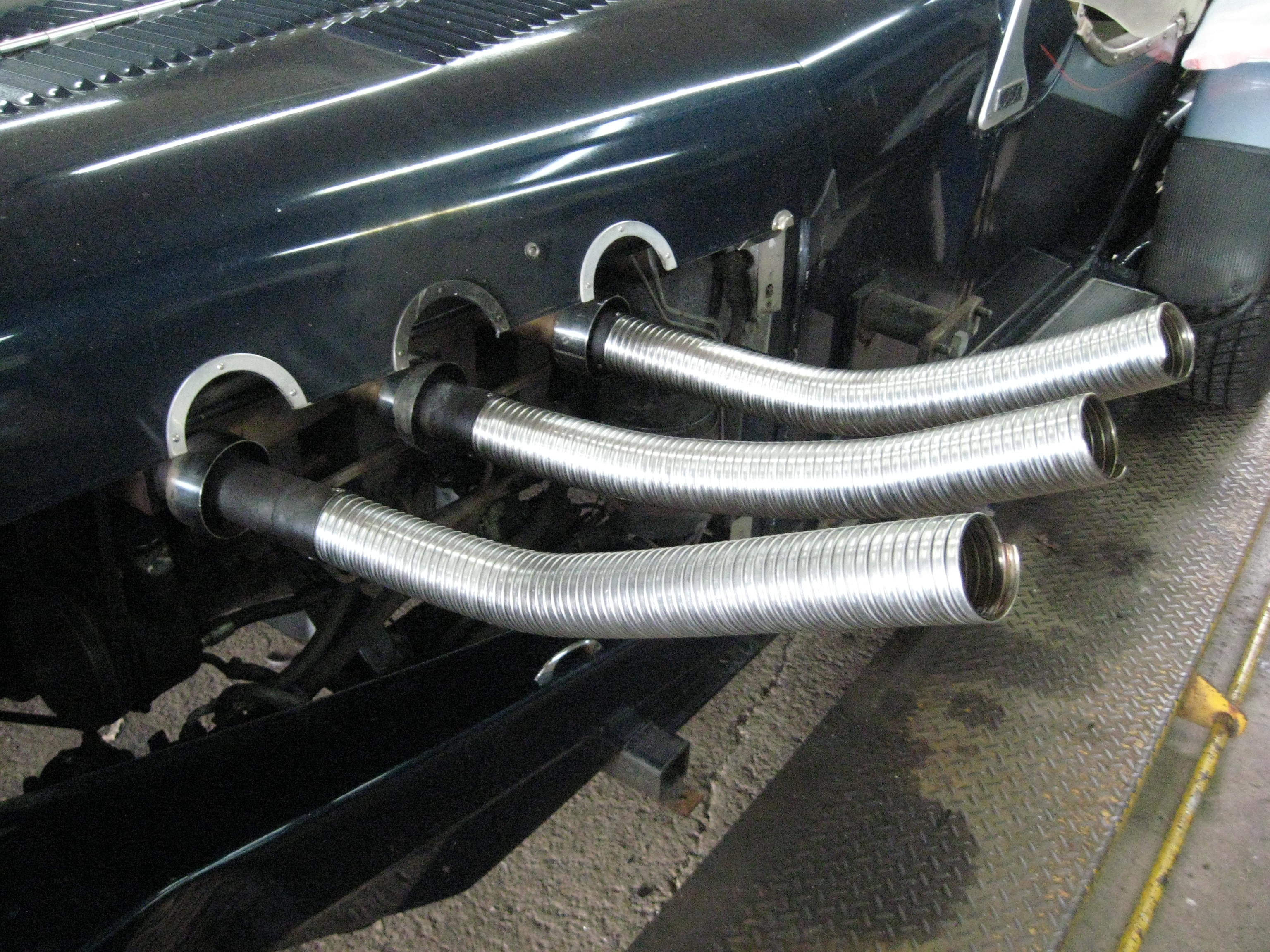 Automotive Exhaust Specialists work